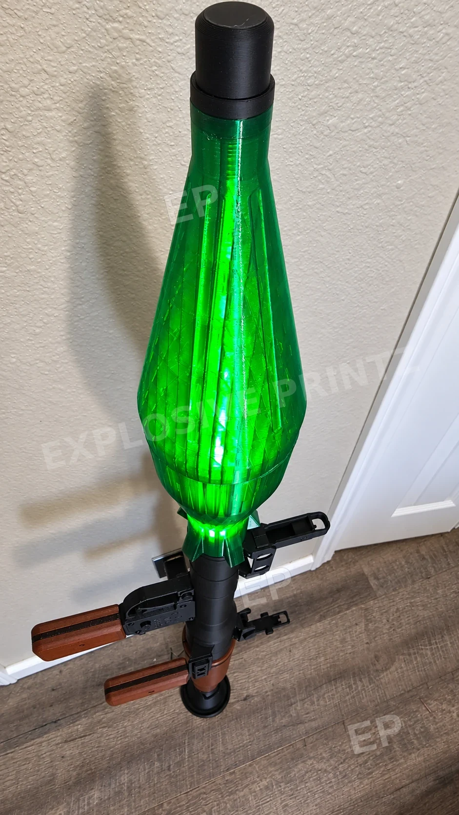 Close-up of the translucent green illuminated rocket